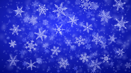 Fototapeta na wymiar Christmas background of complex blurred and clear falling snowflakes in blue colors with bokeh effect