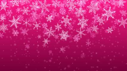 Christmas background of complex blurred and clear falling snowflakes in purple colors with bokeh effect