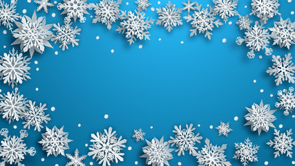 Christmas illustration of white complex paper snowflakes with soft shadows on light blue background