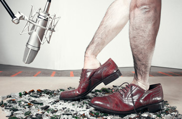 Foley man steps with soundman hands inside the dress shoes. Shoes Color Version