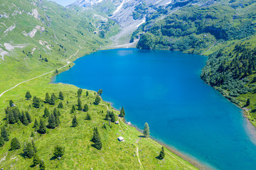 Fototapeta na wymiar Beautiful mountain lake in the Swiss Alps - Switzerland from above