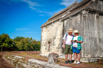 Two Asian boys go on a field trip to see the ancient old city, with the art of the East.