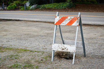 Orange and white diagonal striped construction barricade, Type 2 Barricade