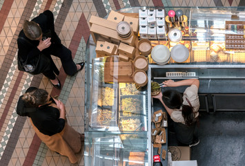 Customers selecting food at a cafe in Sydney Australia