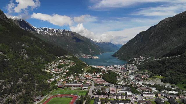 Panoramic pan shot above a beautiful town in a valley