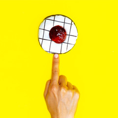  Creative Donut on a yellow background. Flat lay fast food art. Donuts lover concept