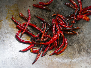 dry red chilli in pan when cooking