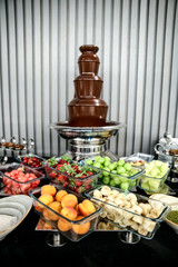 dessert candy open bar stand full with delicious desserts candies and fruits