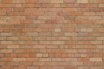 Attractive but grungy rose beige color brick wall texture background