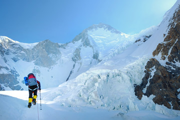 Fototapeta na wymiar Climber reaches the summit of Everest, Nepal.