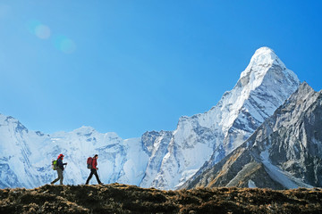 Hiking in himalaya mountains. Travele hiking in the mountains, Nepal. Everest region. - obrazy, fototapety, plakaty