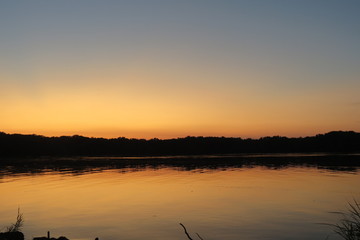Fototapeta premium sunset sky over lake