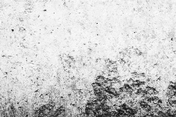 Texture of a concrete wall with cracks and scratches which can be used as a background