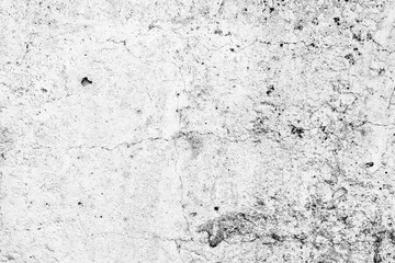Texture of a concrete wall with cracks and scratches which can be used as a background