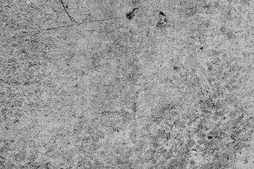 Texture of a concrete wall with cracks and scratches which can be used as a background