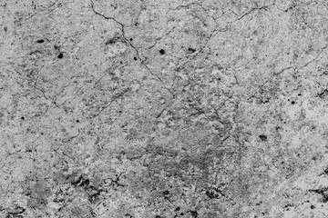 Texture of a concrete wall with cracks and scratches which can be used as a background