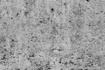 Texture of a concrete wall with cracks and scratches which can be used as a background