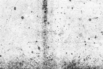 Texture of a concrete wall with cracks and scratches which can be used as a background