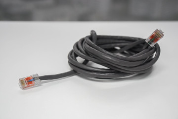 noise LAN cable on office desk for computer set up and connect server