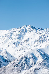 Fototapeta na wymiar mountains in winter, snow capped peaks, mountain winter landscape