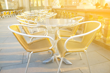 Street cafe with brown tables