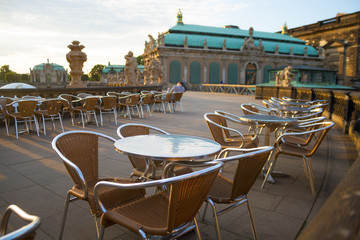 Street cafe with brown tables