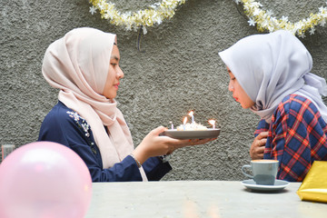 Portrait of two hijab woman bestfriend having time together in celebrate event