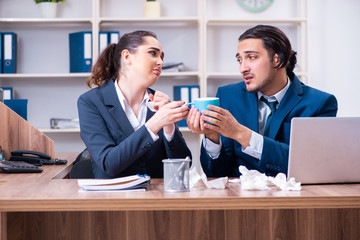Two employees suffering at workplace