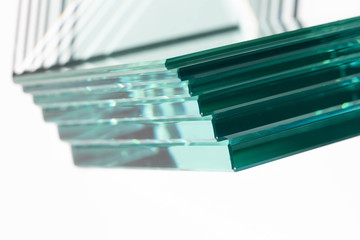 Glass thickness, multiple sizes, stacked for use in buildings and homes.