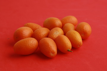 small and delicious orange fruits kumquat