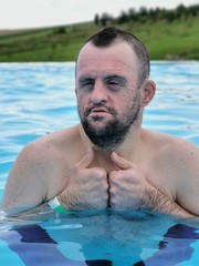 handicapped boy in swimming pool.