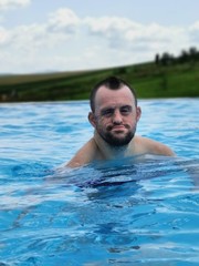 handicapped boy in swimming pool.