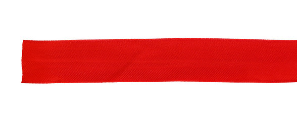 Top view close up of  red ribbon isolated on white background. Flat lay