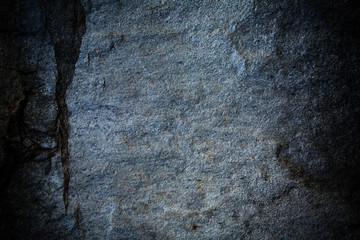 Dark grey slate background or natural stone texture, rock wallpaper