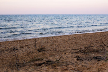 Scattered garbage on the beach. Environmental pollution