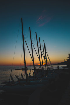 Yachts on the pier at sunset.