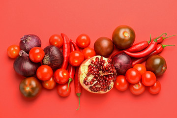 Assortment of fresh vegetables on color background