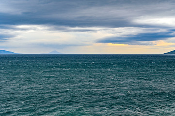 a dark adriatic sea and a cloudy sky