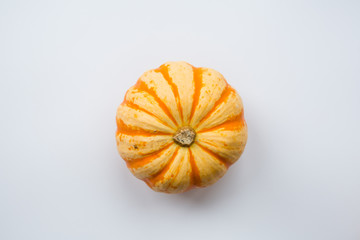 Autumn frame made of orange pumpkins isolated on white background. Fall, Halloween and Thanksgiving concept. Styled stock flat lay photography. Top view. Empty space for your text.