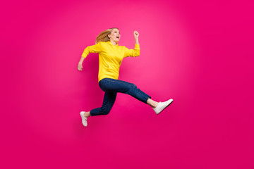 Fototapeta na wymiar Full size photo of crazy lady jumping high running shopping wear casual outfit isolated pink background