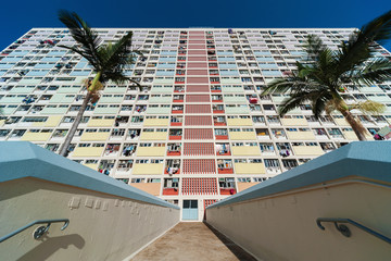 Exterior of high rise residential building in Hong Kong city © leeyiutung