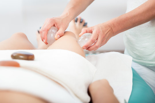 Woman Receiving Thigh Massage