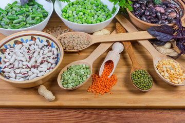 Various uncooked dried and frozen legumes and greens