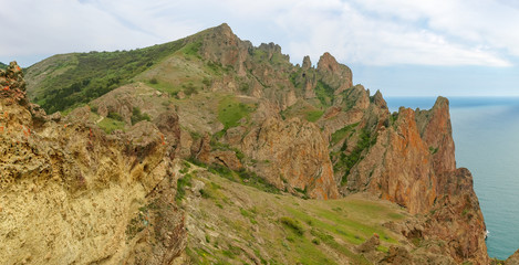 Coastal cliffs of volcanic origin above the sea