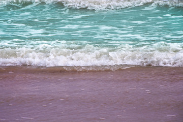 Waves breaking on sandy shore , Landscape nature sea view background