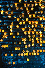 lots of tealights in a christian church