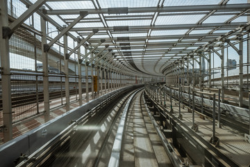 tunnel of monorail road view from front window of a moving train running