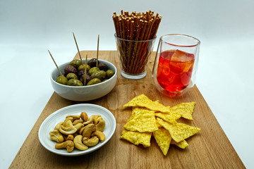 Appetizer set on wooden table, white background