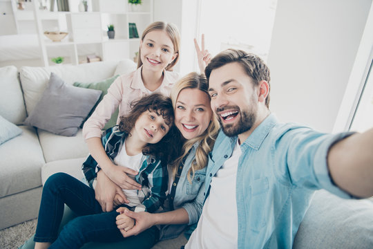 Photo of family two children taking selfies toothy smiling making v-sign symbol hand generation bonding