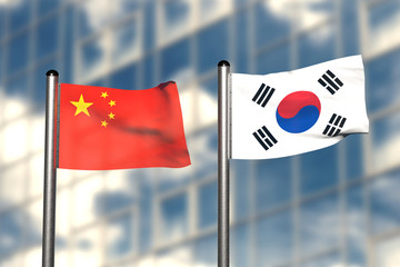 3d render of an flag of China and South Korea, in front of an blurry background, with a steel flagpole
